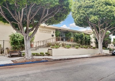 Front entrance showing vegetation and trees